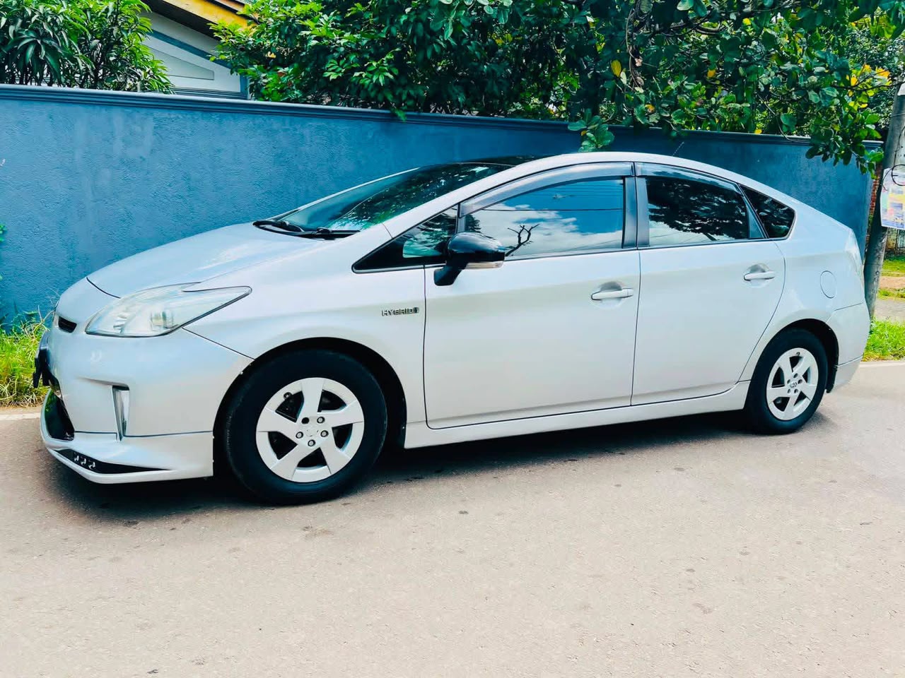White Toyota Prius viewed from the side