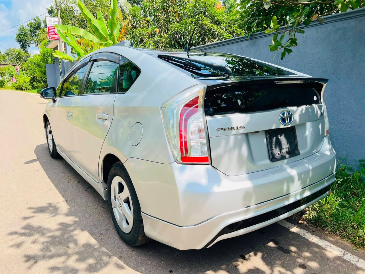 White Toyota Prius viewed from the rear