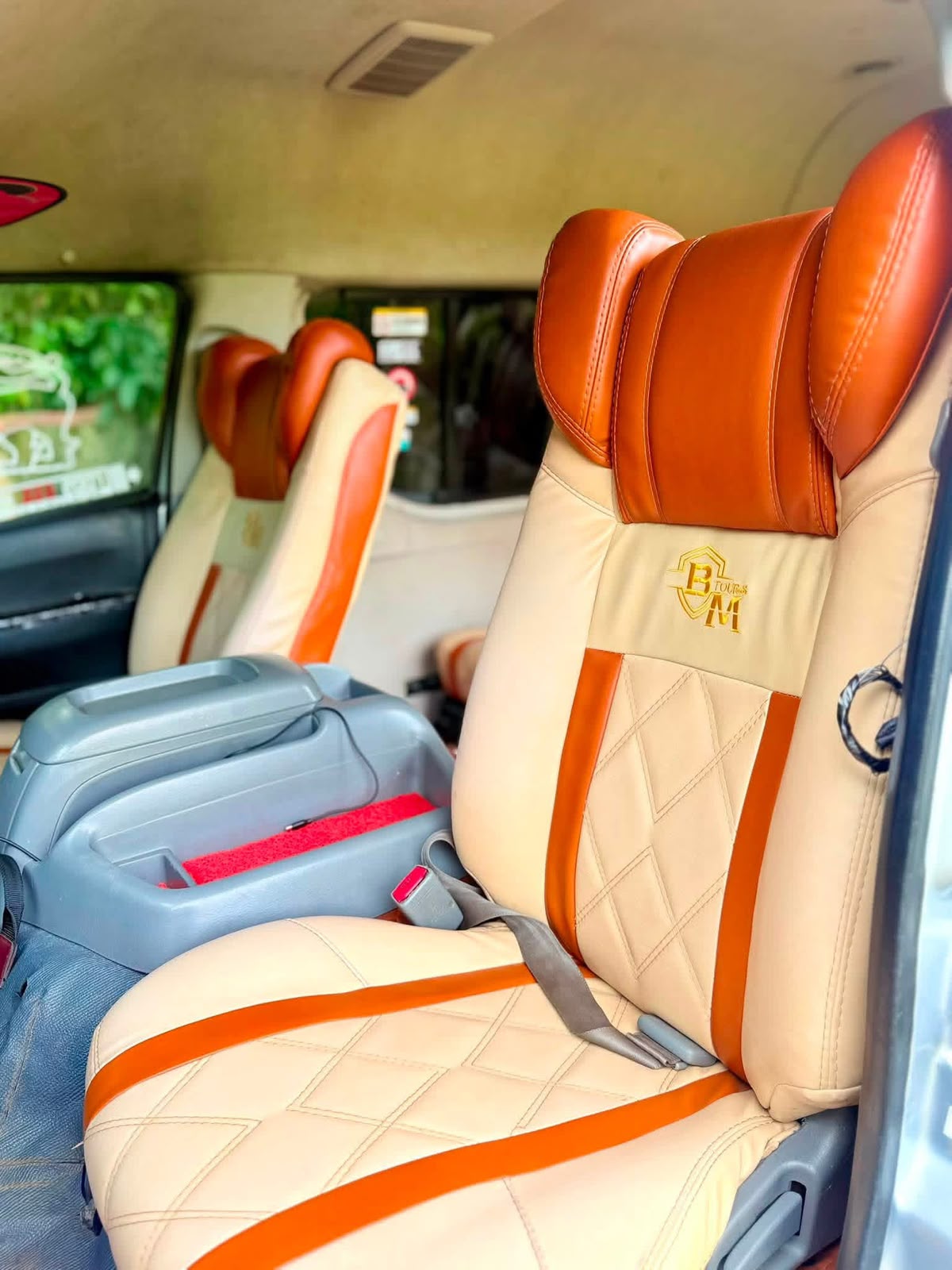 Passenger seating inside a group van